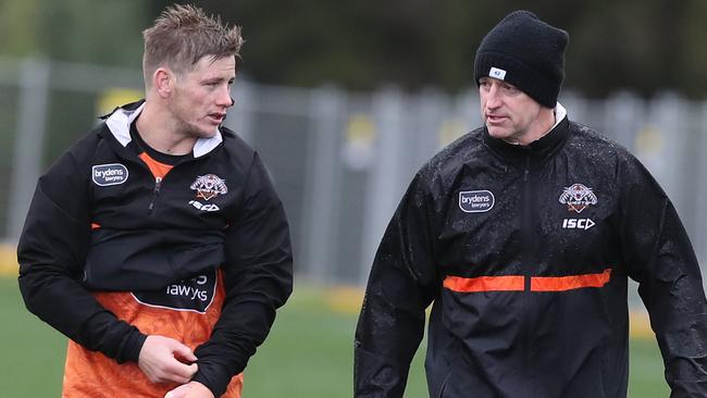 Storm hooker Harry Grant and Michael Maquire during his loan stint with Wests Tigers.