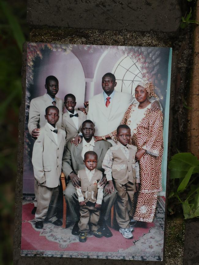 Peter Bol with his family in Sudan, Peter is standing in front of his brother on the left.