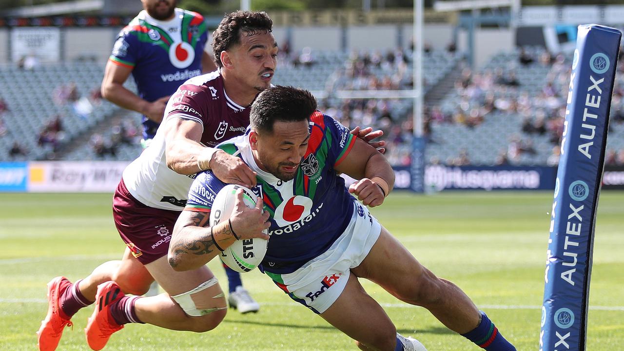 Warriors’ Patrick Herbert scores a try.