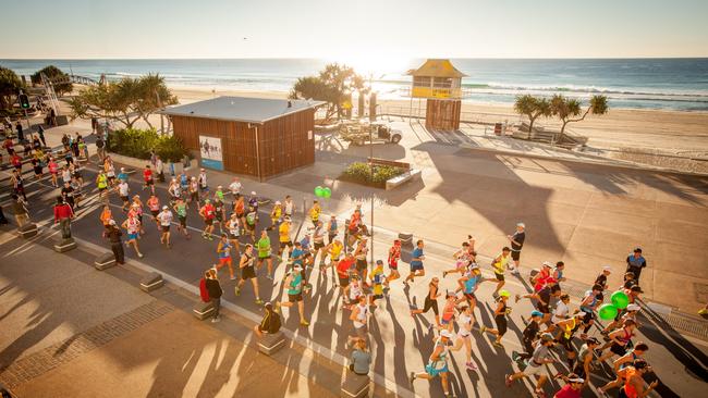 Gold Coast Airport Marathon competitors running through Surfers Paradise. Picture: Tourism and Events Queensland