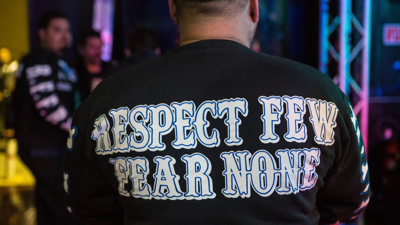 Hundreds of bikies and even more police are attending the funeral of assassinated Rebels boss Nick Martin.