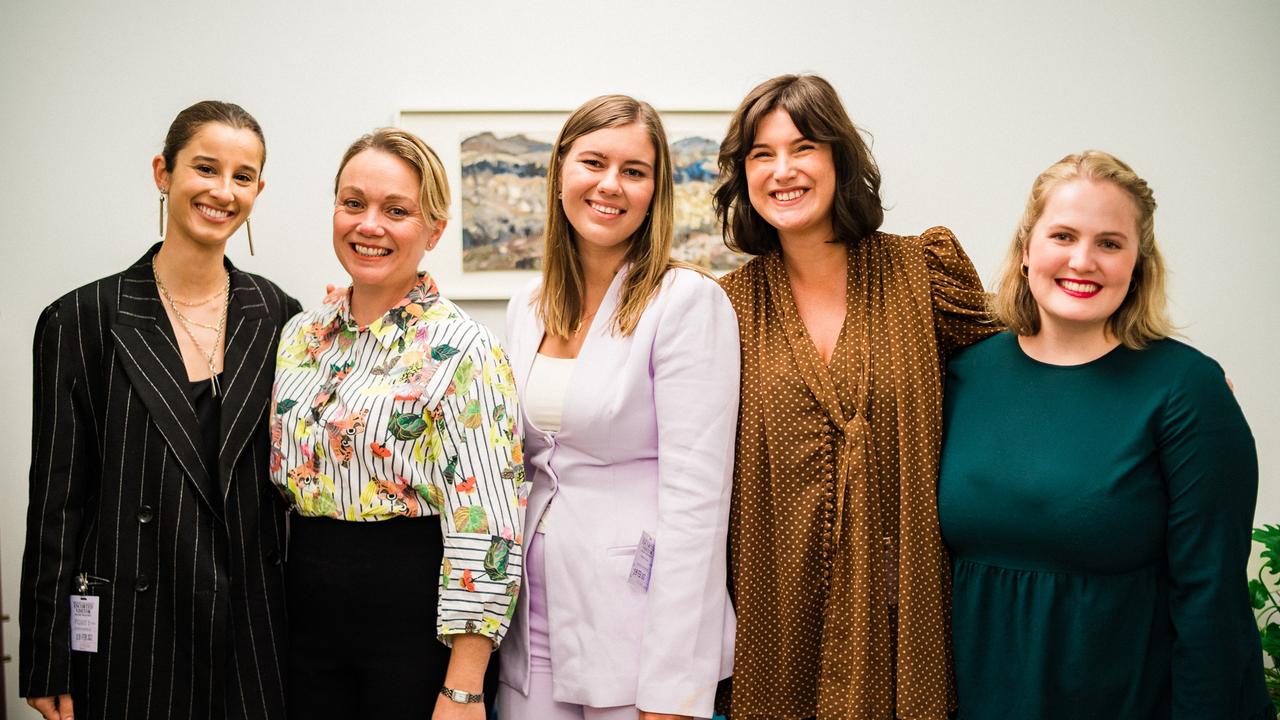 EXCLUSIVE: The powerful moment that almost didn’t happen - Brittany Higgins (centre) poses with Chanel Contos (left), Rachelle Miller (second from left), Chelsey Potter (second from right) and Josie Coles (right) after witnessing the PM’s apology to alleged victims of sexual assault