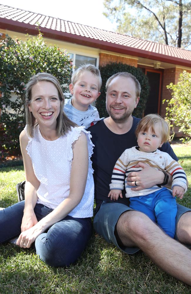 Brett and Kara Toikka and their kids Liam and Owen. The Toikkas were lucky to escape a house fire last year. Picture: David Swift