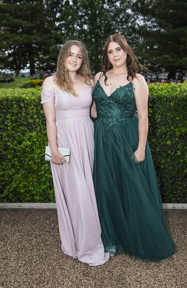 Charlotte Smith (left) and Chelsea Barton at Centenary Heights State High School formal at Picnic Point, Friday, November 15, 2024. Picture: Kevin Farmer