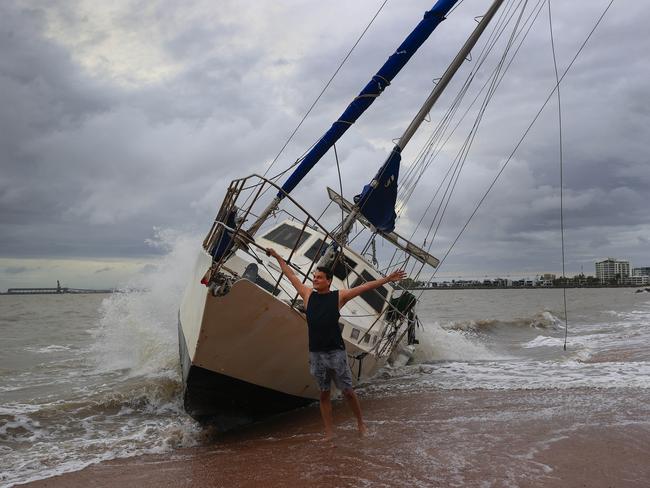 Townsville locals including Dr Deepak Doshi woke early to inspect the damage along The Strand left from TC Kirrily that hit overnight. Pics Adam Head
