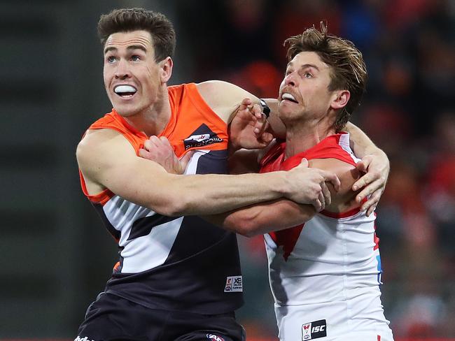 Giants Jeremy Cameron and Sydney's Dane Rampe during the AFL Sydney Derby match between the GWS Giants and Sydney Swans at Spotless Stadium. Picture. Phil Hillyard