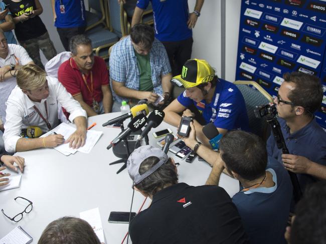 Valentino Rossi discusses his clash with Marc Marquez with the media.