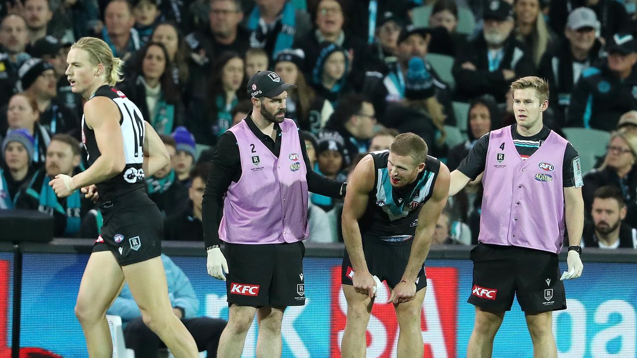 Tom Clurey was subbed out with injury at halftime. Picture: Sarah Reed/AFL Photos via Getty Images