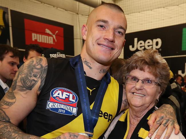 2019 AFL Grand Final. 28/09/2019.  Richmonds Dustin Martin  with his grandmother Lois Knight in the rooms after the 2019 AFL Grand Final match between the Richmond Tigers and the GWS Giants at the MCG on September 28, 2019 in Melbourne, Australia. Picture: Michael Klein.