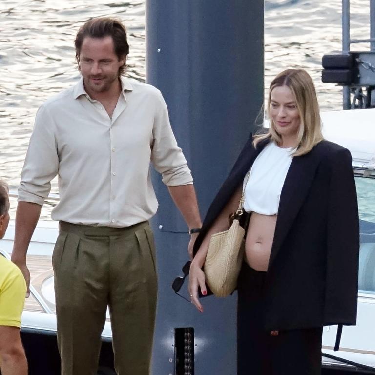 After absolutely dominating the box office with Barbie last year, Margot Robbie and husband Tom Ackerley turned their attention to family matters. The actress’ pregnancy was confirmed in July, and these pictures of the parents-to-be holidaying in Lake Como, Italy, surfaced shortly after. <br/>Picture: Cobra Team/ Backgrid