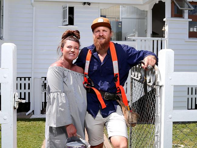 Chris and Tiffany Campbell have done up their Ipswich Queenslander themselves but being a builder, Chris knew how to avoid dangers such as asbestos and dodgy wiring. Picture AAP/David Clark