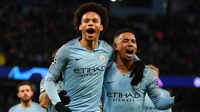 Leroy Sane and Gabriel Jesus of Manchester City celebrate scoring against TSG 1899 Hoffenheim.