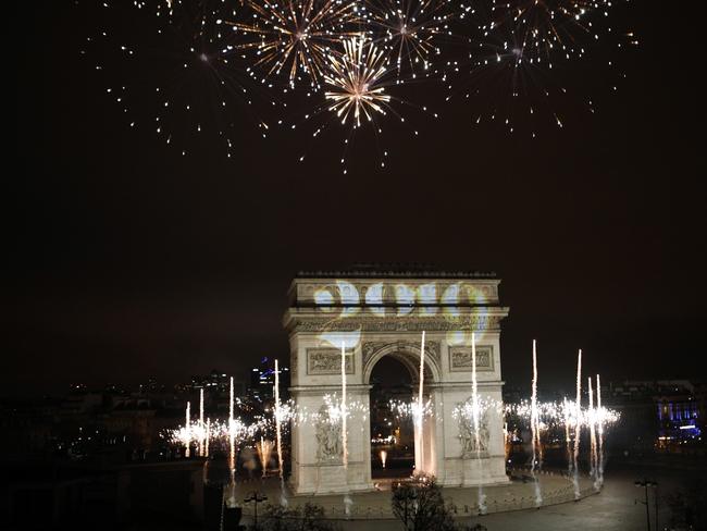 Fireworks explode over the Arc de Triomphe during the New Year's Day celebrations. Picture: AP