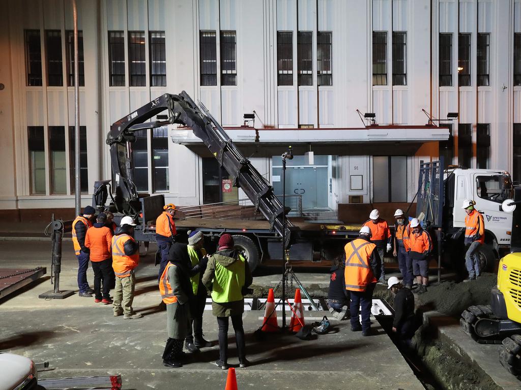 Work in Macquarie Street Hobart on the hole that will house the chamber performance artist Mike Parr will live in for 72 hours during Dark Mofo. Picture: NIKKI DAVIS-JONES