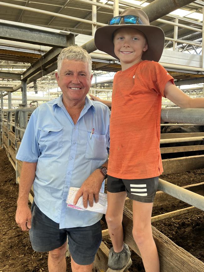 Malcolm Carson and his son Hugh, 10, from Docker, were looking to buy steers at the Wangaratta weaner sale. Picture: Fiona Myers