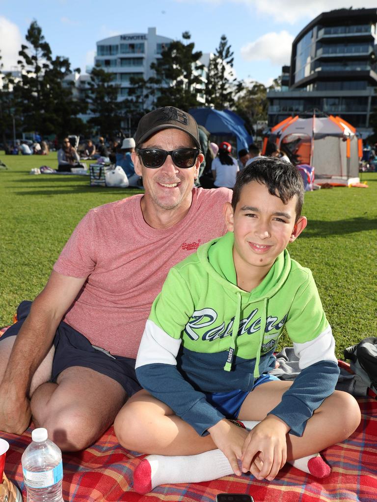 Josh and Carter Fogg. Locals and visitors arrived early to get a good spot for the Geelong New Years Eve celebrations. Picture: Alan Barber