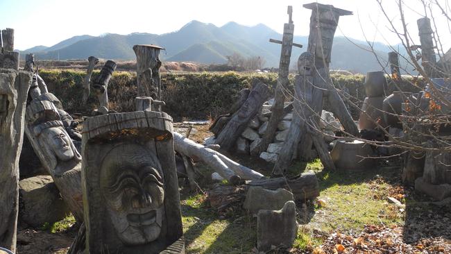 The Hahoetal masks standing guard at the front of the Hahoe village.