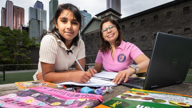 Grade five student 10 year old Belicia Batra with her tutor Reema Verma at RMIT Alumni Courtyard. Picture: Tony Gough