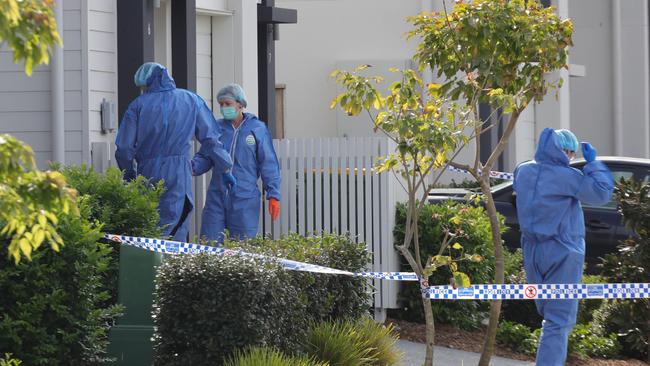 Forensic officers at the home where Shane Bowden was gunned down overnight. Picture: Glenn Hampson