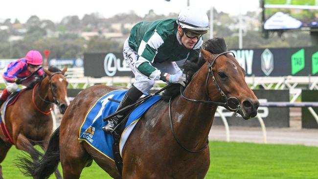 MELBOURNE, AUSTRALIA - SEPTEMBER 14: Mark Zahra riding Growing Empire winning Race 4, the Winning Edge Poseidon Stakes - Betting Odds during Melbourne Racing at Flemington Racecourse on September 14, 2024 in Melbourne, Australia. (Photo by Vince Caligiuri/Getty Images)