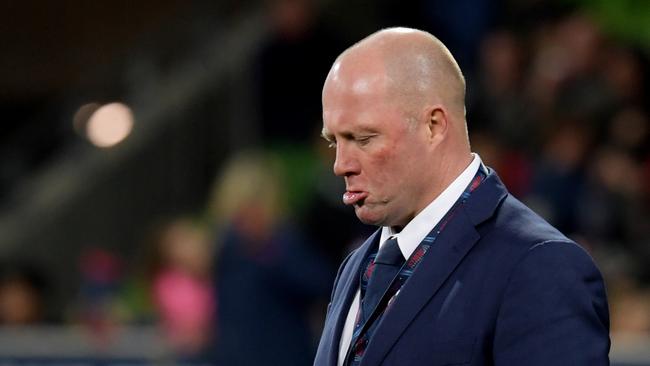 Coach Tony McGahan of the Rebels watches a warm-up at AAMI Park in Melbourne.