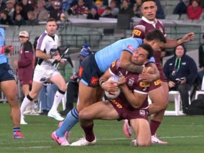 Latrell Mitchell appears to collect Xavier Coates high in Origin II.
