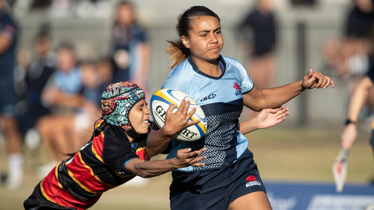 Holly Williams powers her way through the defence on her way to scoring.