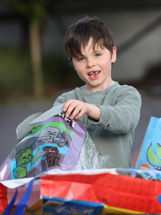 Harry loved the Minecraft showbag. Picture: David Caird