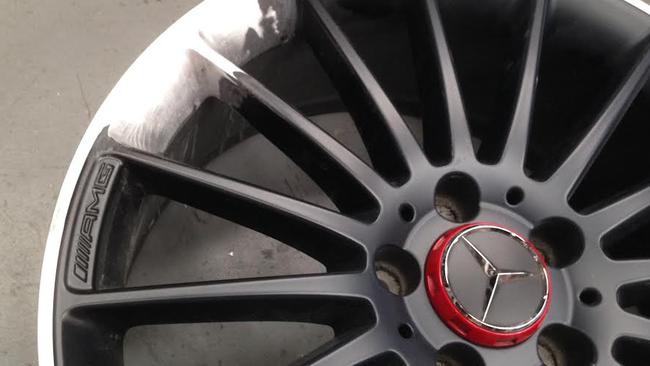 Repair job ... a genuine Mercedes AMG wheel being fixed. An original replacement is $2500. Picture: Joshua Dowling