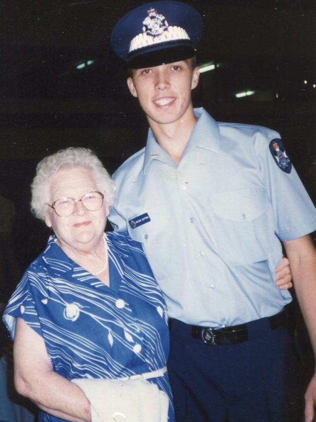 Mr Dutton as a young police officer with his grandmother. Picture: Supplied