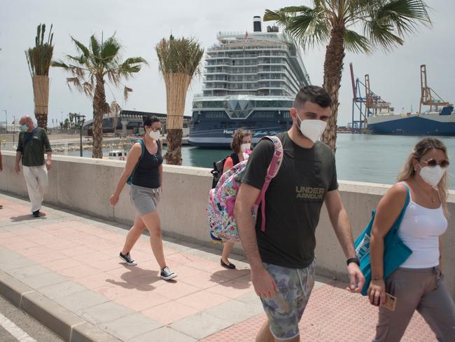 Travel is back in Europe! Tourists disembark from a German cruise ship in Spain. Picture: AFP