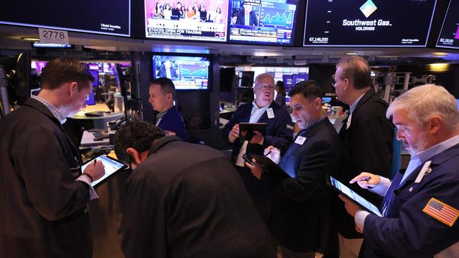 Traders work on the floor of the New York Stock Exchange. Picture: Michael M. Santiago/AFP