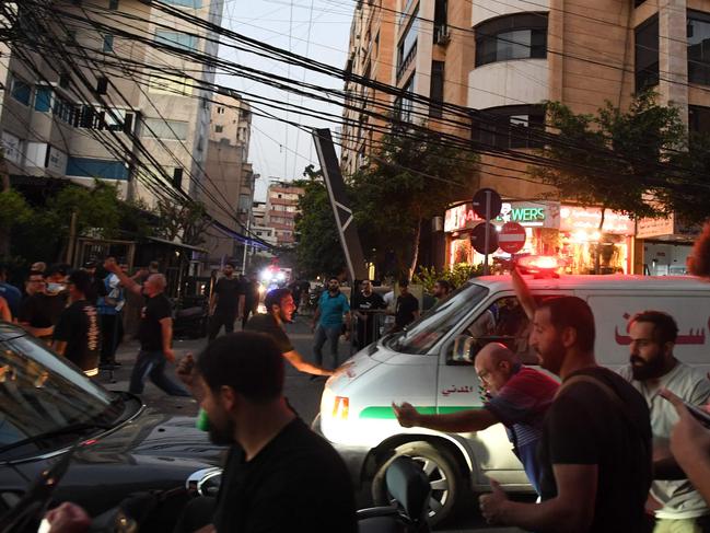 Ambulances are seen following an Israeli military strike on a building in Beirut's southern suburbs. Picture: AFP