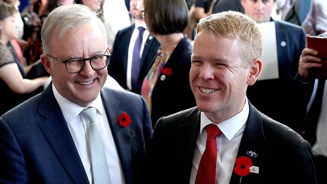 Australian Prime Minister Anthony Albanese and New Zealand Prime Minister Chris Hipkins chat after a citizenship ceremony in Brisbane on Sunday. Picture: Pat Hoelscher/AFP