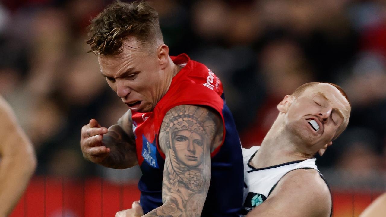 MELBOURNE, AUSTRALIA – JUNE 02: James Harmes of the Demons and Matthew Cottrell of the Blues collide during the 2023 AFL Round 12 match between the Melbourne Demons and the Carlton Blues at the Melbourne Cricket Ground on June 2, 2023 in Melbourne, Australia. (Photo by Michael Willson/AFL Photos via Getty Images)