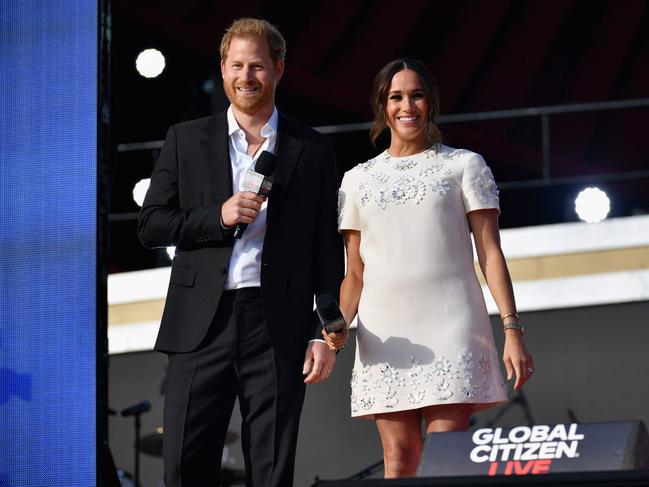 The pair addressed the crowd at the star-studded concert. Picture: AFP