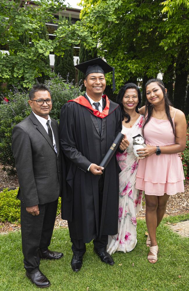 Master of Cyber Security graduate Danyu Rajbahak with dad Dev Kumar Rajbahak, mum Neki Rajbahak and sister Neki Rajbahak at a UniSQ graduation ceremony at The Empire, Wednesday, October 30, 2024. Picture: Kevin Farmer