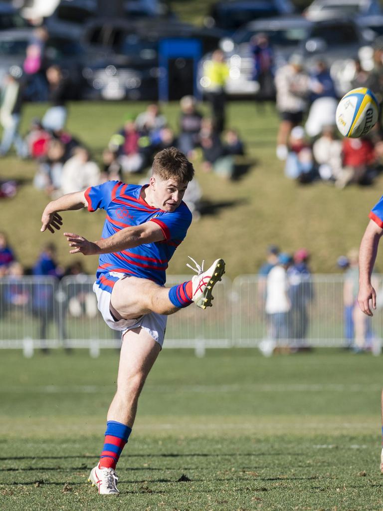 Braith Clark kicks for Downlands in the O'Callaghan Cup on Grammar Downlands Day at Toowoomba Grammar School, Saturday, August 19, 2023. Picture: Kevin Farmer