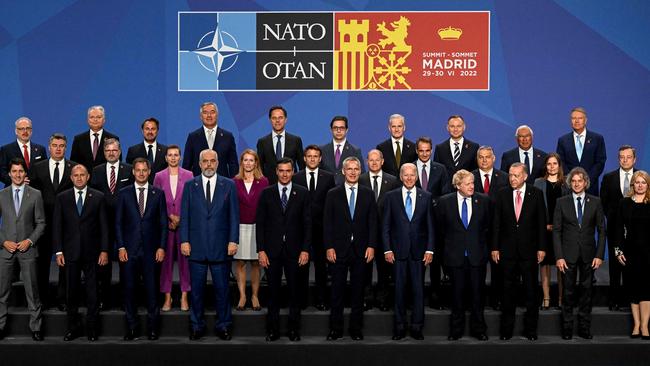 Heads of state and government pose for the official group photo during the NATO summit in Madrid. Picture: AFP