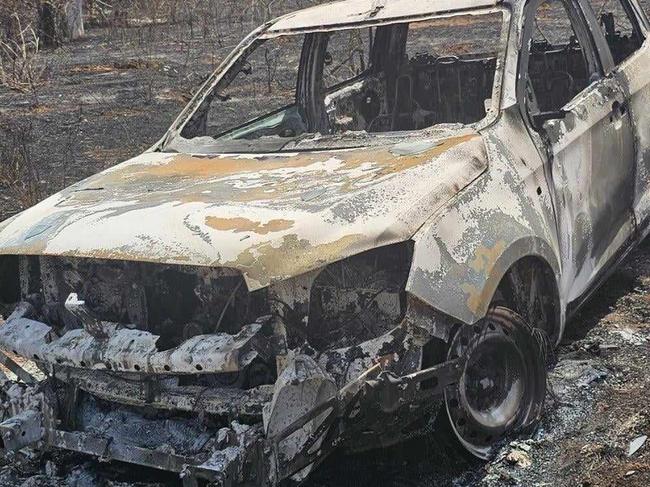 Charred remains: A new QCS work ute lies damaged after a routine burn-off at a Townsville low-security farm turned dangerous, reigniting in high winds on Wednesday, September 11.