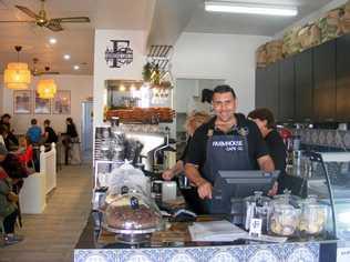 Owner, Toby Robinson mans the till on opening day at The Farmhouse Cafe. Picture: DEIRDRE SMITH