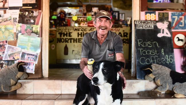 Missing man Paddy Moriarty outside the Larrimah pub with his dog.