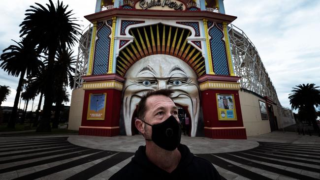 Scott McLeay wears a face mask while out for exercise in St Kilda on Saturday, July 11. Picture: Getty