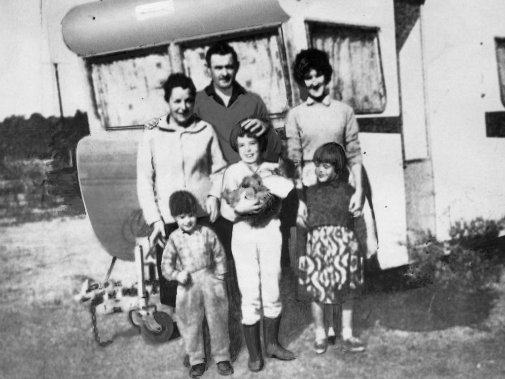 <p>The Beaumont family with an unidentified woman posing before a caravan. Clockwise from top left, Nancy Beaumont and her husband Jim, an unidentified friend, Arnna, Jane and Grant.</p>