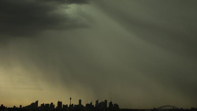 Storm clouds moving in over Sydney. Picture: Jonathan Ng