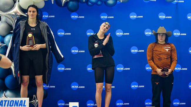 University of Pennsylvania swimmer Lia Thomas accepts the winning trophy for the 500 Freestyle finals. Photo by Rich von Biberstein/Icon Sportswire via Getty Images.