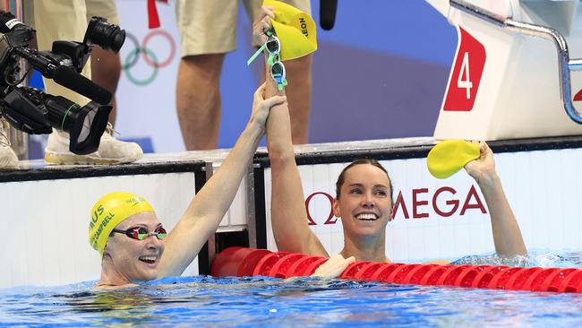 Emma McKeon celebrates her win with Cate Campbell. Picture: Adam Head