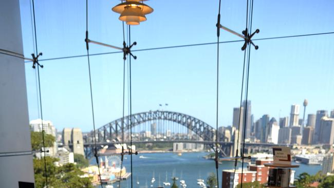 The stunning view of the Sydney Harbour Bridge and the city from inside Shore’s library. Picture: Elenor Tedenborg