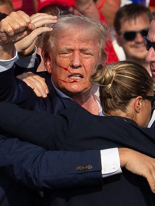 A bullet grazed Trump’s ear in the shooting. Picture: Rebecca DROKE/AFP. Picture: Rebecca DROKE / AFP