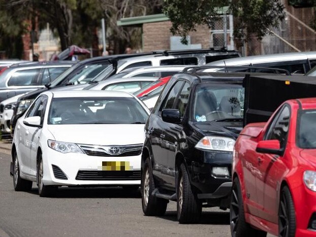 Wolli Creek has been inundated with rideshare drivers who queue on the same four streets for passengers at the International Airport. (Number plates censored out.) Picture: AAP/Julian Andrews